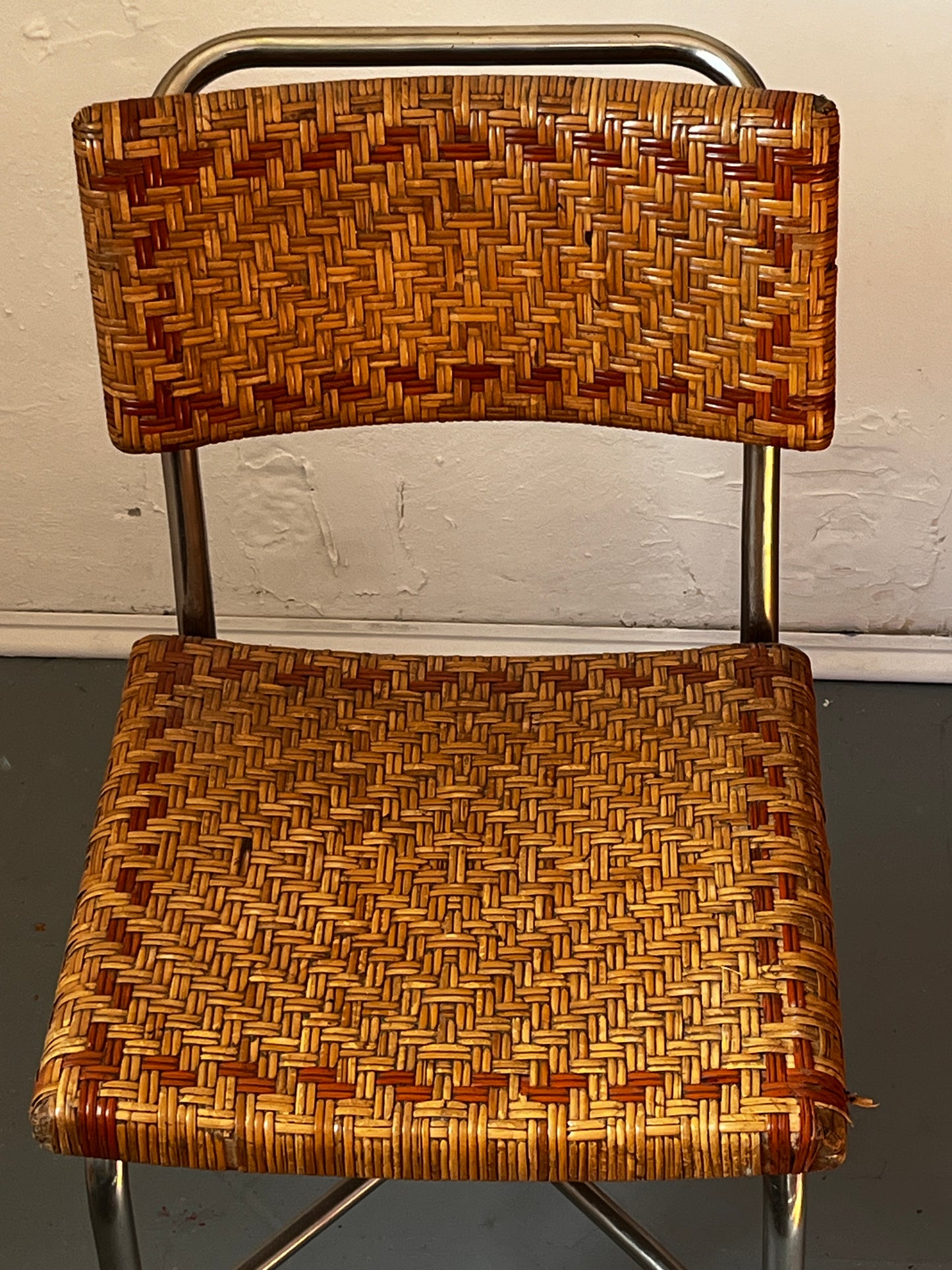 Steel tube armchair and stool set